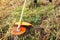 Gardener mowing weeds with brush cutter. Worker trimming dry grass with manual gasoline trimmer with metal blade disk