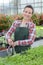 Gardener with plants at home