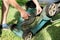 gardener repair and fix the a lawn mower in gardens