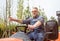 Gardener rides on the tractor at garden store