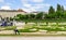 Gardener works on Belvedere palace gardens