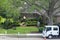 Gardeners landscaping a suburban house in Lakeview neighborhood