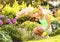 Gardening. Blonde woman planting flowers in garden