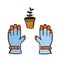 Gardening gloves and flower pot