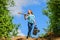 Gardening guide for beginners. Gardening tips. Spring gardening. Girl child hold shovel watering can. Spring gardening