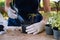 Gardening in house, Gardener prepares the soil