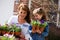 Gardening: Parent and Child Ready To Plant Flowers