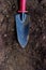 Gardening - small garden trowel on soil