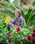 Gardening stimulates the mind and body of the senior adult woman