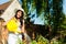 Gardening in summer - woman watering flowers