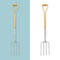 Gardening tool. Stainless steel border digging fork with wooden handle for home or vegetable garden. Equipment for lawn care