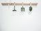 Gardening tools hanging on wooden rack