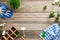 Gardening tools and plants on vintage wooden table, cultivation plant and gardening concept. Flat lay, top view, composition with