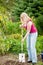 Gardening - woman digging over the soil