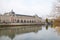 Gare D Orsay or Orsay museum building with Seine river and autumn tree in a cloudy day in Paris