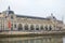 Gare Orsay or Orsay museum building and Seine river view in a cloudy day in Paris