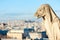 Gargoyle against blue sky - Paris