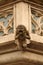 Gargoyle at balcony of medieval town hall in Ulm, Germany