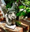 Gargoyle garden decoration in contrasting light