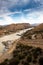 Gariep Damn wall, with water flowing through the dam gates into the river