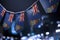 A garland of Cayman Islands national flags on an abstract blurred background