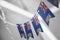 A garland of Falkland Islands national flags on an abstract blurred background