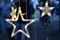 Garland in the form of a star glows in the dark on a dark blue background