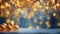 Garland with golden sphere-shaped ornaments on snow against an unfocused background with blue and yellow lights