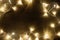 Garland of lamps christmas lights on light wood background copy space