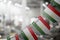 A garland of Tajikistan national flags on an abstract blurred background