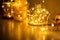 Garlands and decorations to create a cozy home, Golden lights on a wire, a candlestick, a vase, a snow glass ball and other