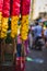 Garlands of red and yellow flowers. Flower stall selling garlands for temple and marriage functions. Selling flowers Garlands on