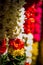 Garlands of red and yellow flowers. Flower stall selling garlands for temple and marriage functions. Selling flowers Garlands on