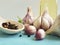 garlic, black pepper bottle oil aromatic kitchen nutrition vegetable on blue wood