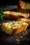 Garlic bread with butter and parsley on a dark background