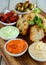 Garlic bread served with mint and salsa dip