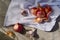 Garlic cloves and onion folk medicine on a gray baggy background and a white towel. close-up, selective focus