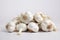 Garlic, cloves and white bulb isolated on white, in the style of karencore, visual puns, youthful energy