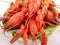 Garlic crayfish image River crayfish on a saucer of bright red color