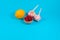 Garlic head, lemon and cranberry on a blue background as an antiviral agent
