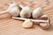 Garlic head with peeled clove of garlic Closeup on wooden backg