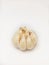 Garlic on isolated white background, one bulb of garlic, one head of garlic, one knob of garlic, raw fresh unpeeled garlic