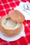 Garlic soup served in a loaf homemade rye flour bread Bowl (Slovakian cuisine:cesnakova polievka)