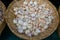 Garlic. Vegetables. Fragment in wooden basket in a market