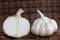 Garlic wiht onion close up on wooden background