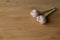 Garlic on a wooden table. closeup garlic isolated on wooden table