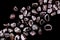 Garnet heap up stones texture on black background