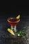 Garnished cocktail on black background