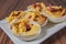 Garnished deviled eggs,plate,cutting board