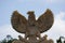 Garuda Pancasila (Indonesian five principles) with a natural background